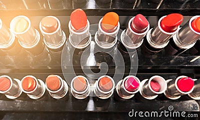 Closeup lipstick. Fashion Colorful many Lipsticks . Beautiful Make-up concept Stock Photo